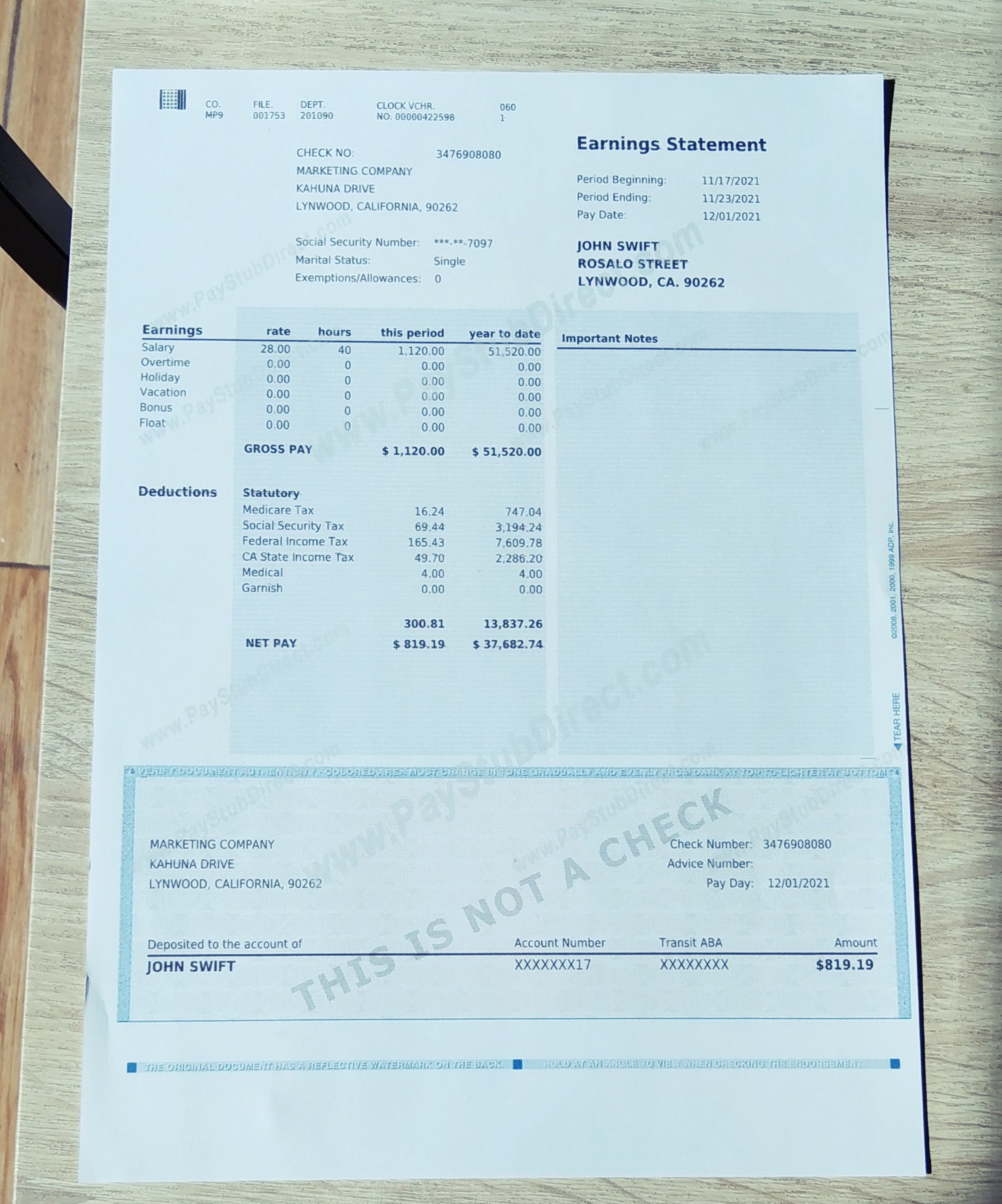 pay stub on a coffee table